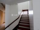 Modern wooden staircase inside a home