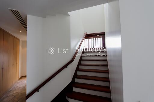 Modern wooden staircase inside a home