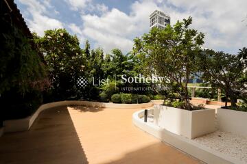 Spacious outdoor garden with pathways and greenery