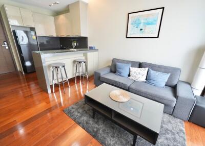 Modern living room with adjoining kitchen