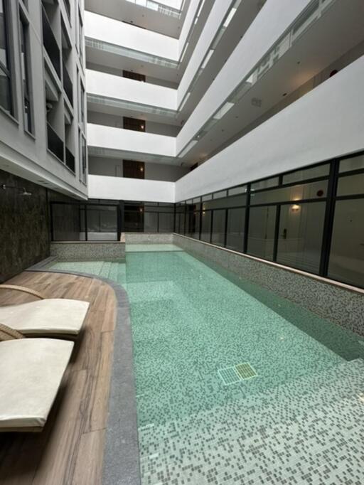 Indoor swimming pool in a modern apartment building