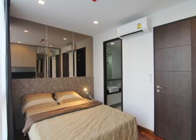 Modern bedroom with double bed and en-suite bathroom