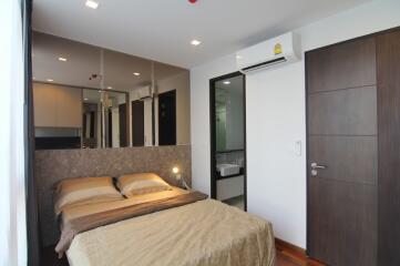 Modern bedroom with double bed and en-suite bathroom