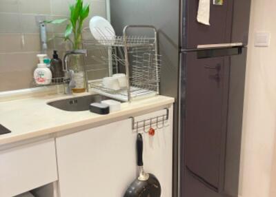 Modern kitchen with refrigerator and sink