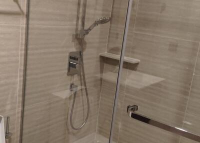 Modern bathroom with glass shower enclosure