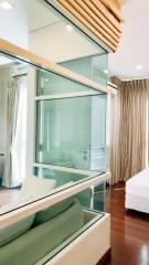 Modern bedroom with glass partition