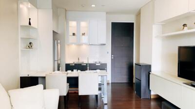 Modern kitchen and dining area with sleek furniture