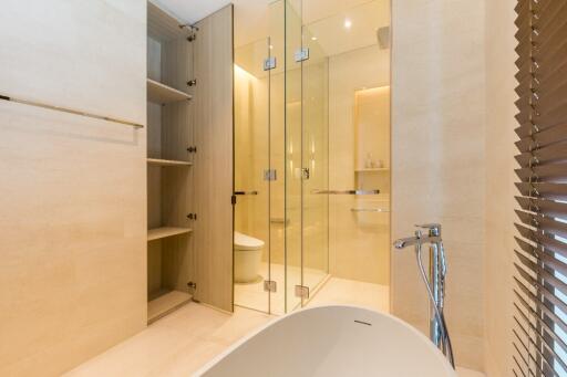 Modern bathroom with glass shower and bathtub