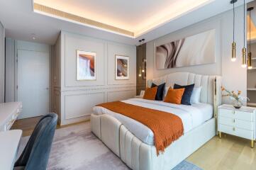 Spacious and modern bedroom with king-sized bed and elegant decor