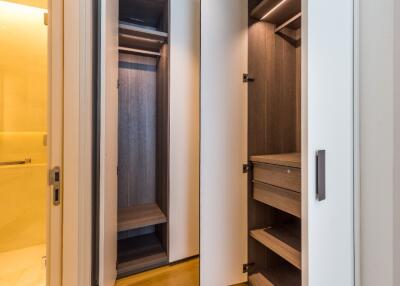 Open closet with built-in shelves and hanging space