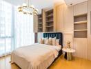 Beautifully decorated bedroom with natural light and built-in shelving