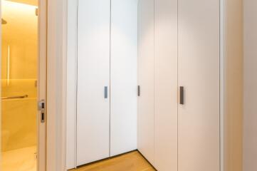 Hallway with built-in closets