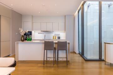 Modern kitchen with island and bar stools