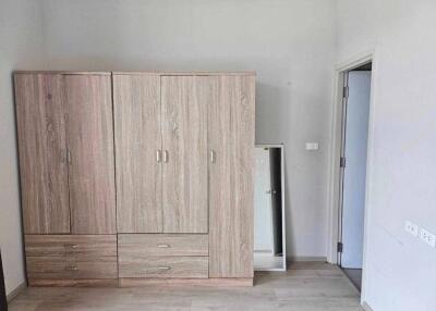 Bedroom with wooden wardrobe