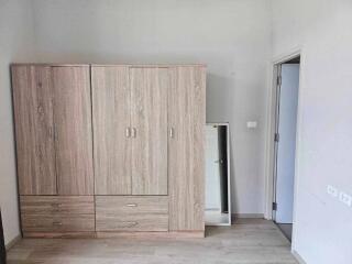 Bedroom with wooden wardrobe