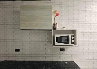 Modern minimalist kitchen design with subway tile backsplash