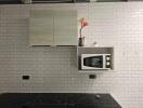 Modern minimalist kitchen design with subway tile backsplash