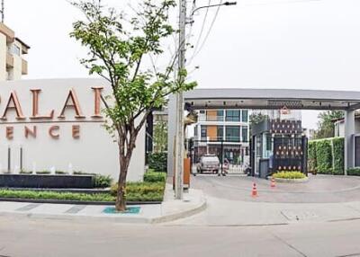 Front view of the Supalai Essence building complex entrance