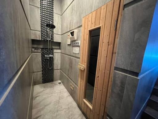 Bathroom with shower and sauna