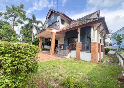 Front view of a house with a garden