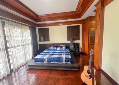 Bedroom with guitar