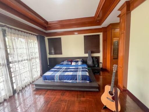 Bedroom with guitar