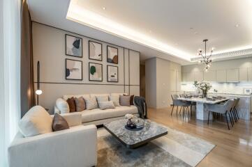 Modern living room with open kitchen and dining area