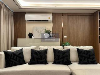 Modern living room with sofa and air conditioner