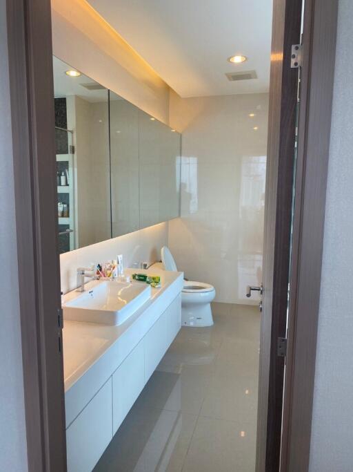 Modern bathroom with large mirror and double sink