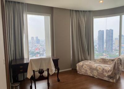 Bedroom with cityscape view