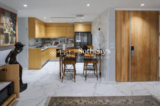 Modern open kitchen and dining area with contemporary decor