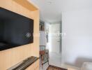 Bedroom with TV and wooden desk