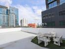 Rooftop with cityscape view and outdoor seating