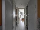 View down a hallway leading to a bedroom