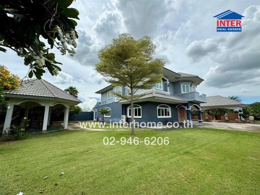 Two-story house with a spacious garden