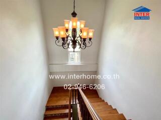 Staircase with chandelier