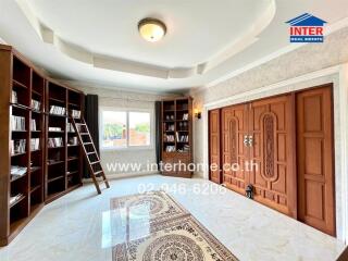 Spacious library with wooden bookshelves and cozy lighting