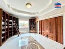 Spacious library with wooden bookshelves and cozy lighting