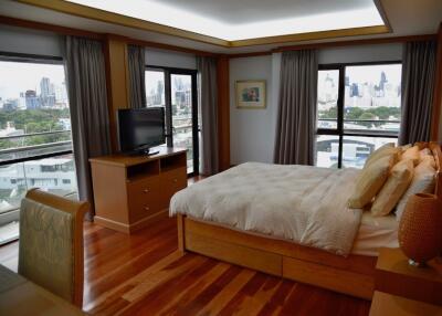 Spacious bedroom with city view