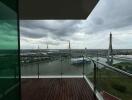 Balcony with river and bridge view