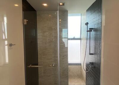 Modern bathroom with glass shower enclosure