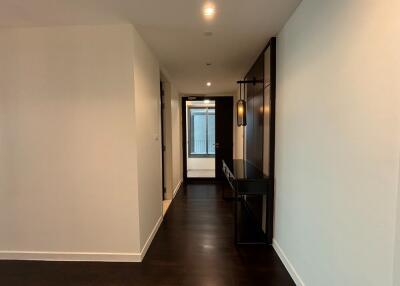 Modern hallway with wooden floor and minimalistic design