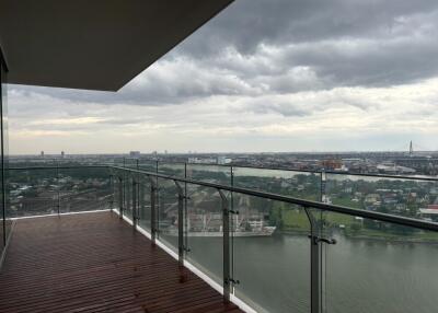 City view from balcony with glass railing