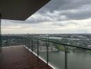 City view from balcony with glass railing