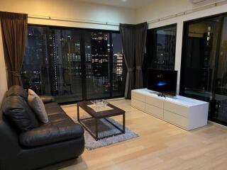 Modern living room with city skyline view