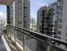 View from balcony overlooking high-rise buildings