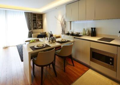 Modern kitchen and dining area with natural light