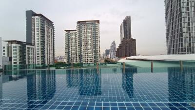 Rooftop pool with city skyline view