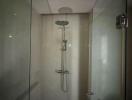 Shower area with glass enclosure