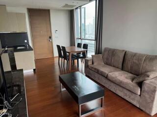 Spacious living room with kitchen and dining area